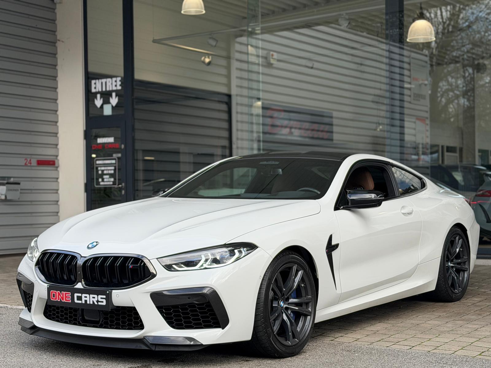 White BMW 4 Series 420d M Sport in front of the ONE CARS showroom